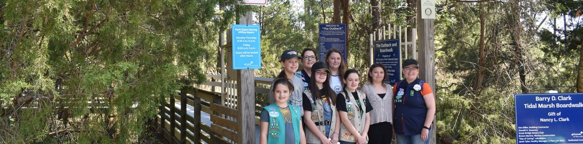  Girl Scouts at the entrance to The Outback behind A Place for Girls in Chesapeake, Virginia 