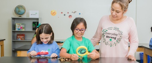 Girl Scouts and a volunteer Girl Scouts and a volunteer
