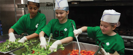 Girl Scouts performing community service