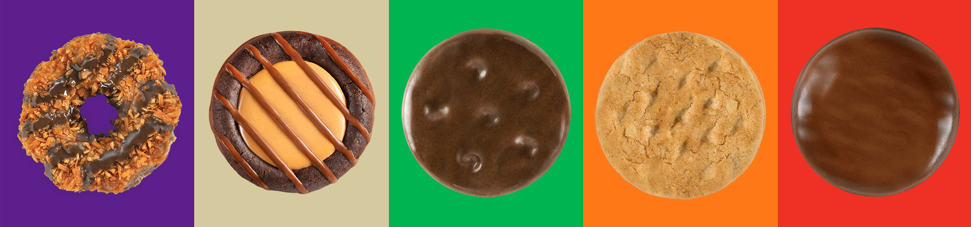  girl scouts selling cookies with one girl in front of booth holding sign that says 