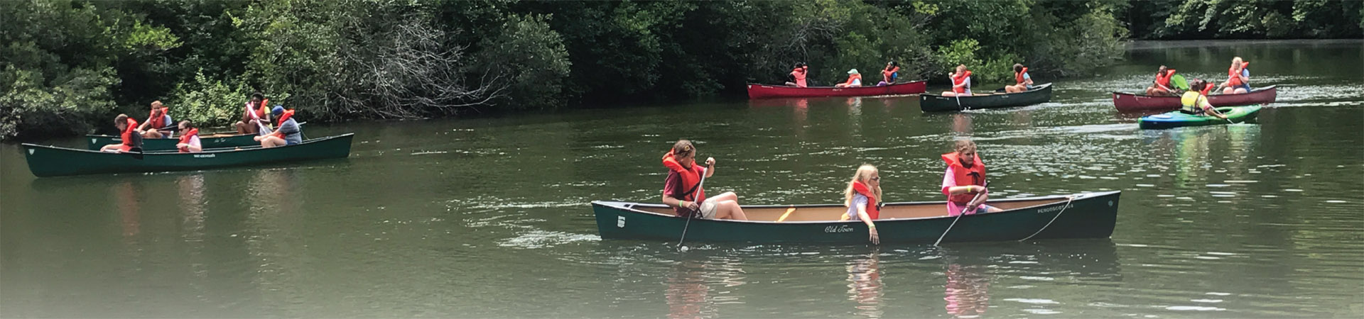  Girl Scouts in canoes at Camp Skimino 