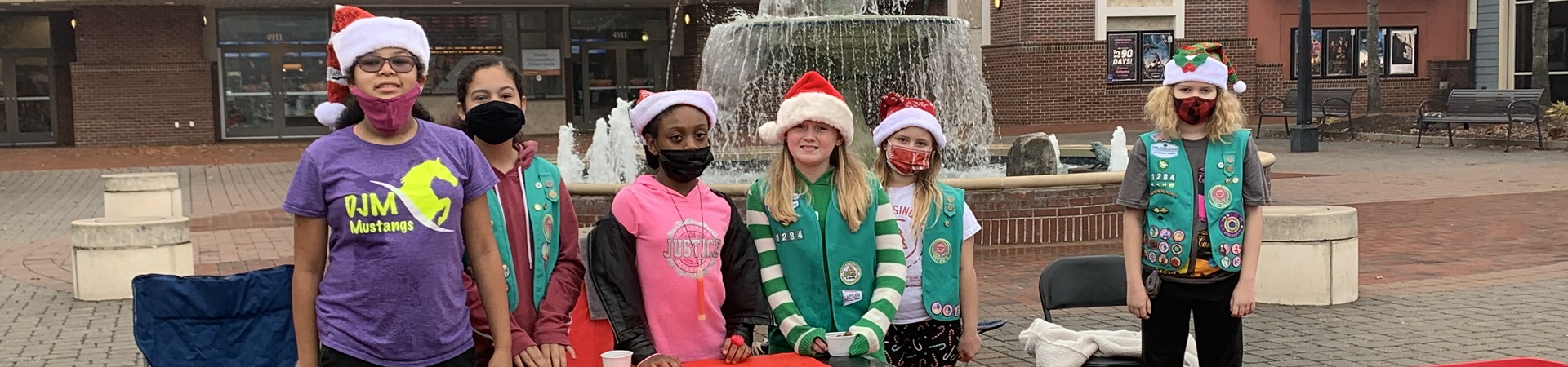  Girl Scouts collecting food for charity at the holidays in Williamsburg, Virginia 