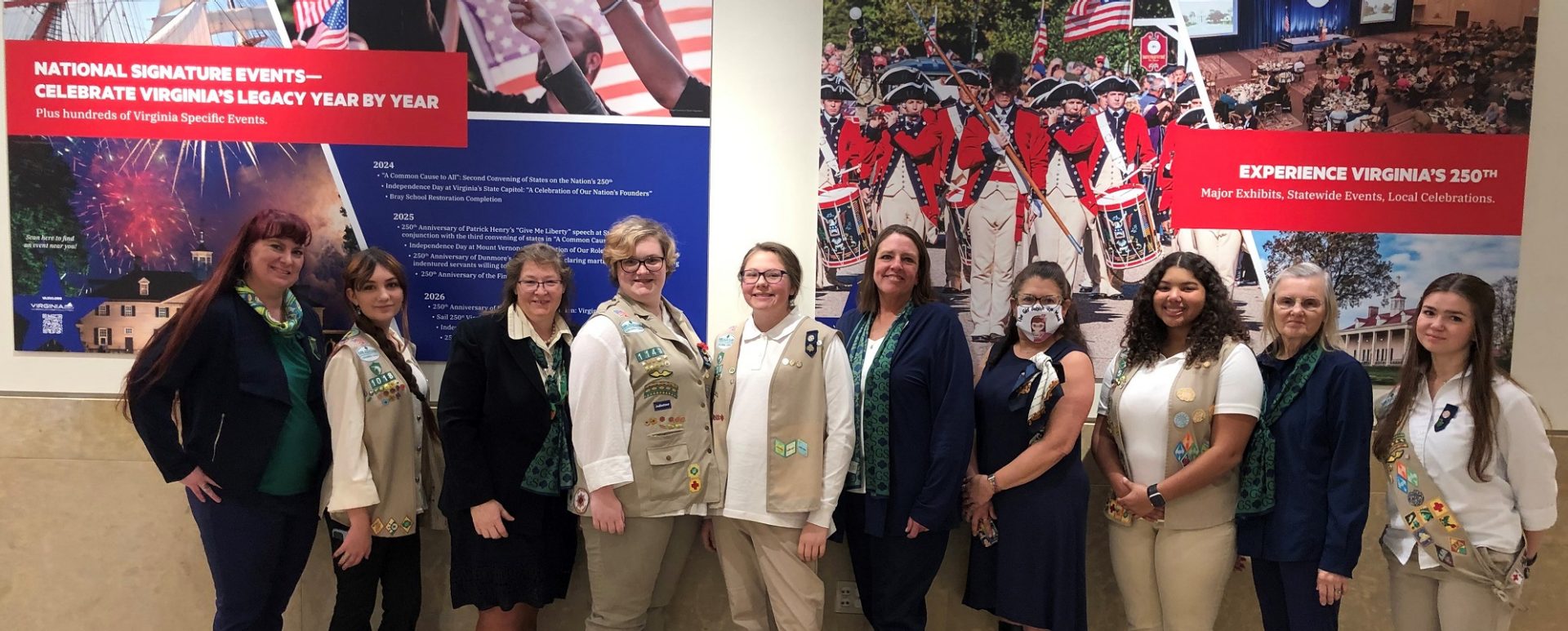  Group from GSCCC in front of an exhibit in the new General Assembly Building promoting the Virginia American Revolution 250 Commemoration, for the upcoming 250th anniversary of the American Revolution, the Revolutionary War, and the independence of the United States in the Commonwealth of Virginia.  