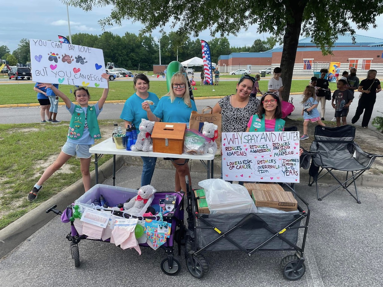 Girl Scout Juniors Evelyn and Lucy from Troop 422 in Suffolk at Creekside Elementary School's ‘National Night Out’ community event