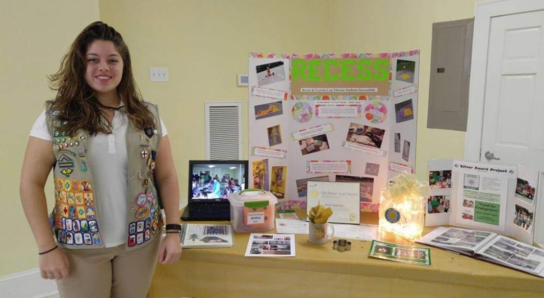 Angie’s daughter Ariel with her Gold Award presentation