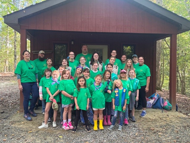 Girl Scout Junior Alice with Troop 57 at camp