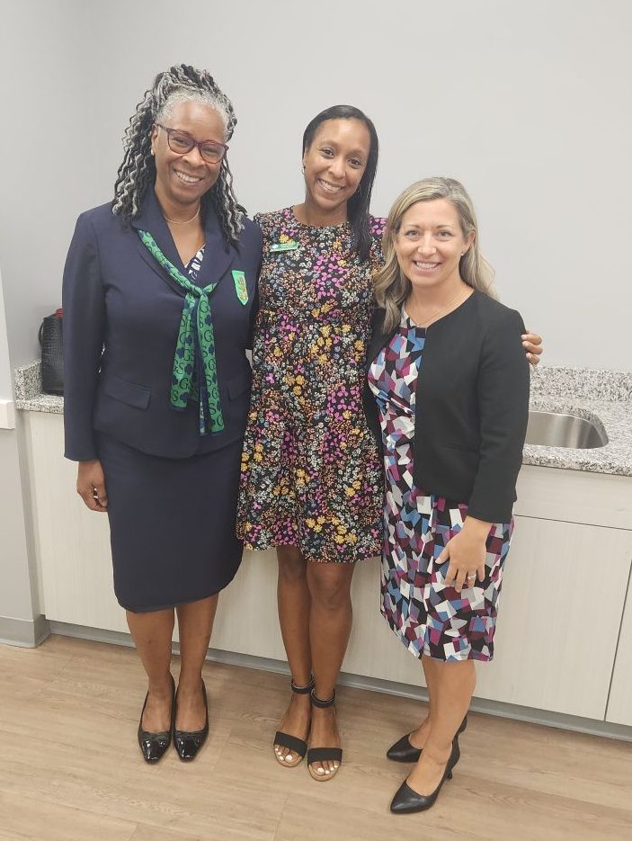 Alexis Majied (center) at a Girl Scout event