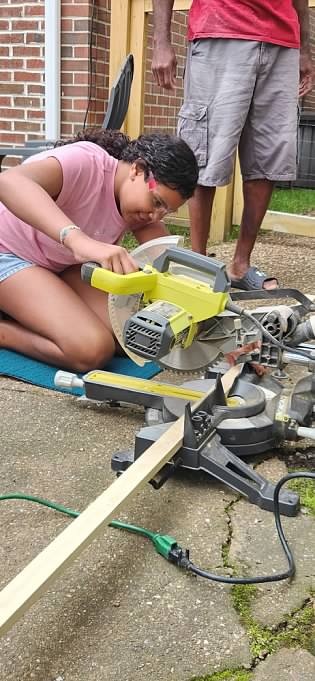 Girl Scout Cadette Kaylani learned how to use power tools for her Silver Award project