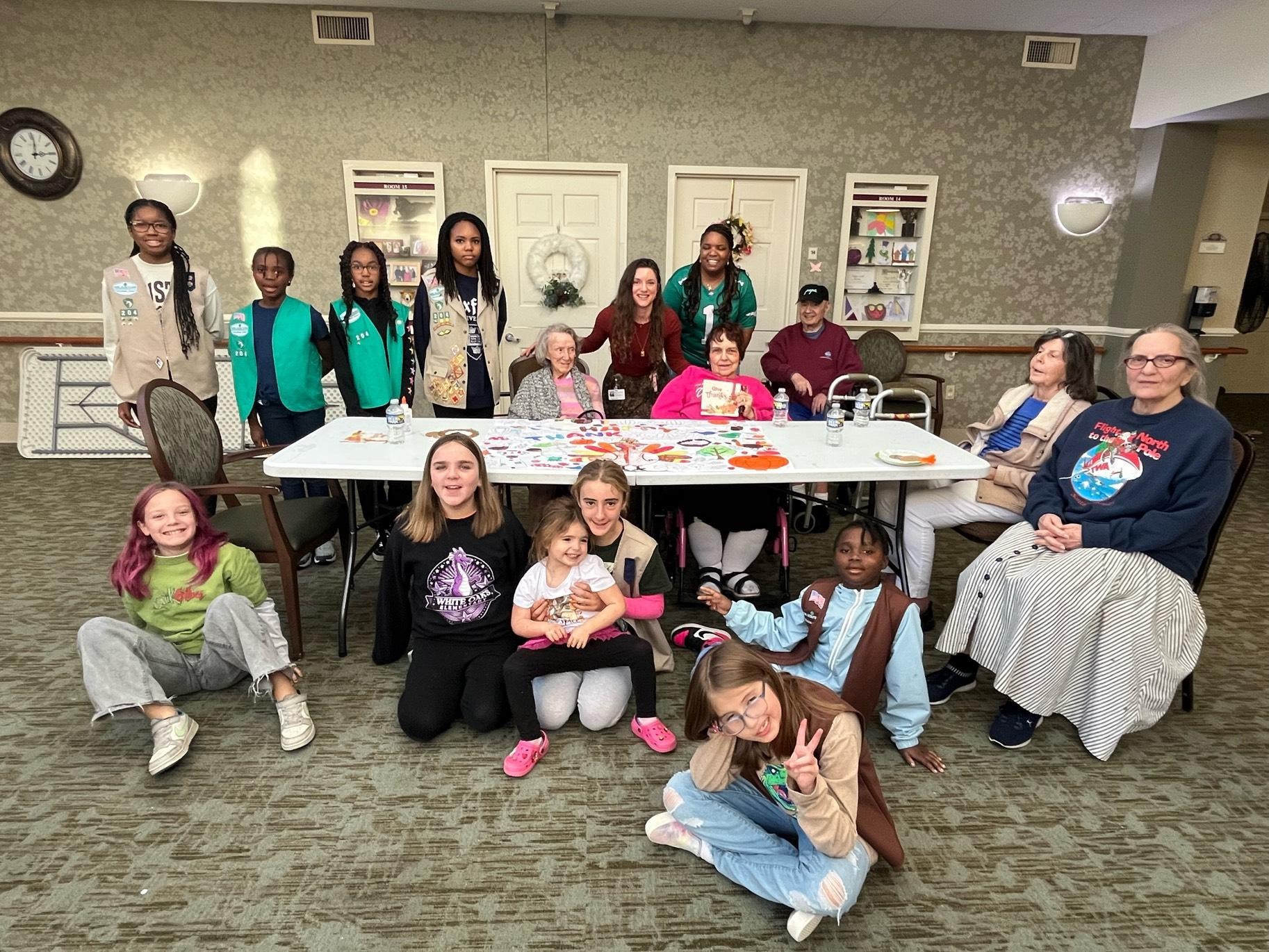 Troop 204 in Virginia Beach visited Maimonides Health Center and met with seniors in their memory care unit.