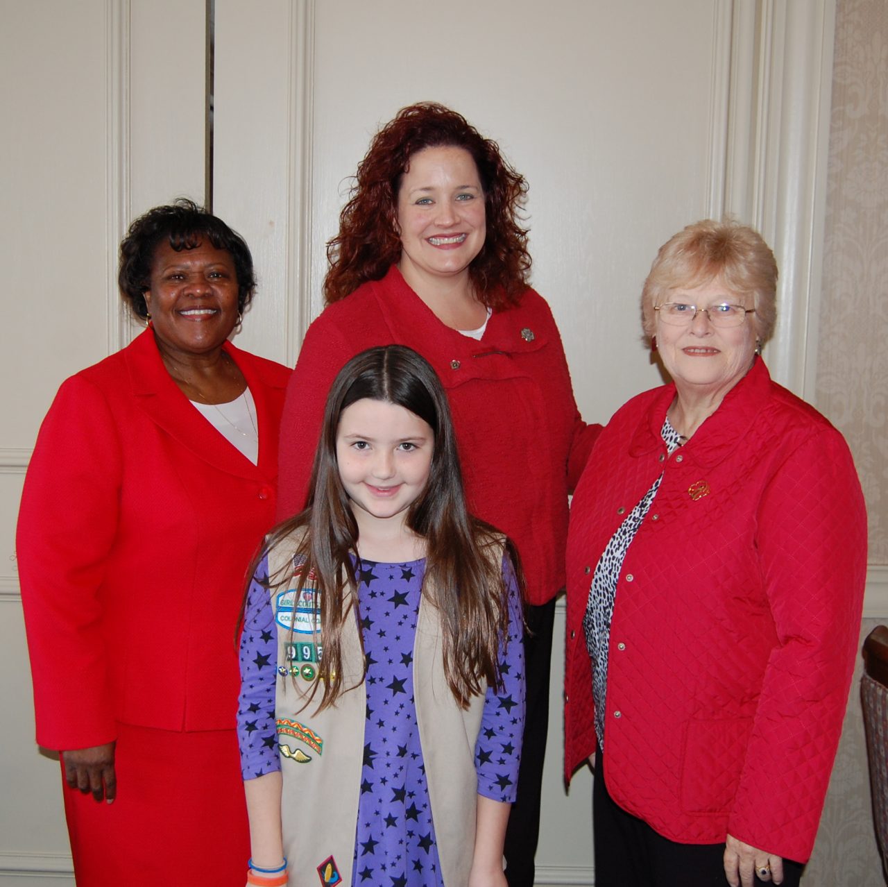 Mary Ellen Maxwell at a President’s Luncheon for the holidays with Tracy Keller and Sandra DeLoatch