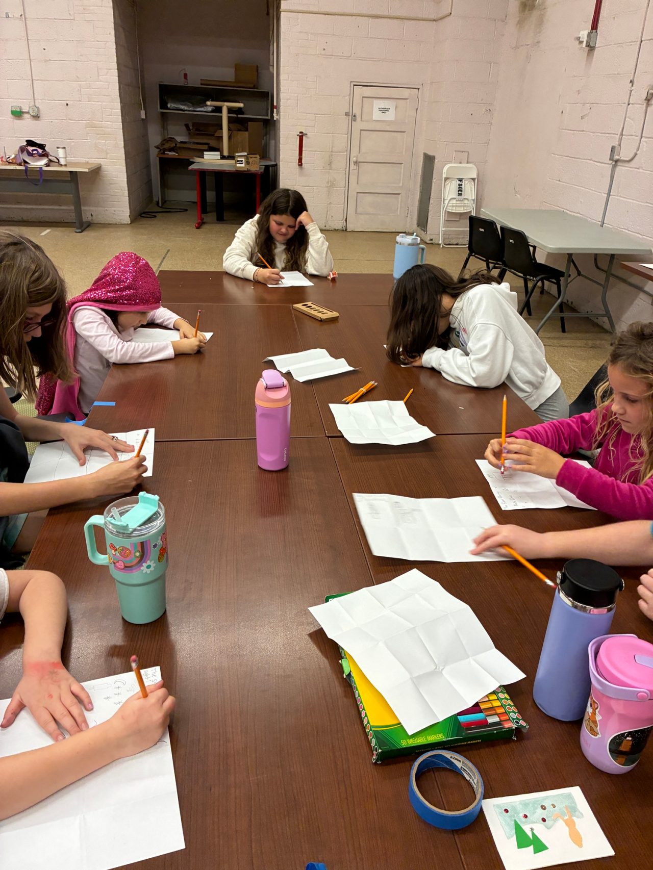 Girl Scout Juniors from Troop 1993 work on their Bronze Award project together