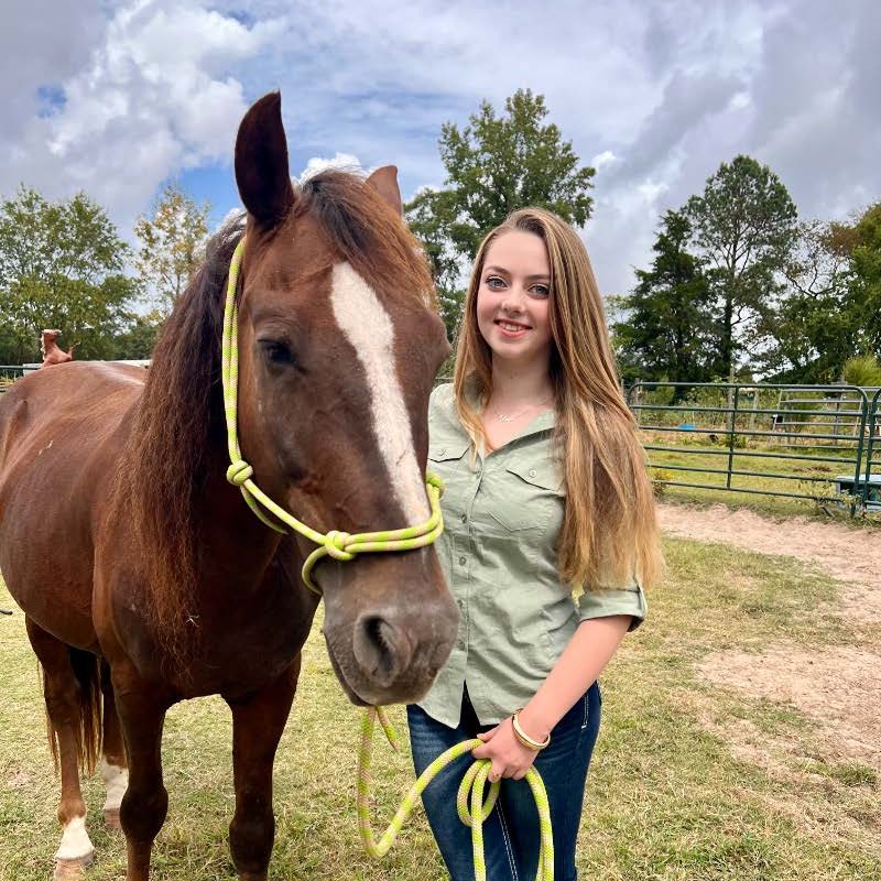 Lana with a therapy horse