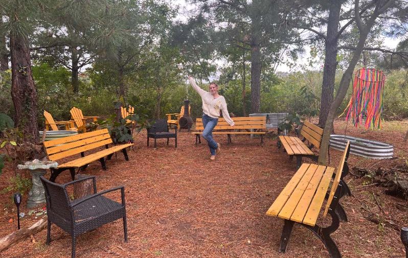 Lana poses in her new outdoor therapy space