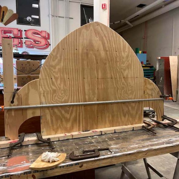 Girl Scout Nomi built custom shelving for the reading nooks