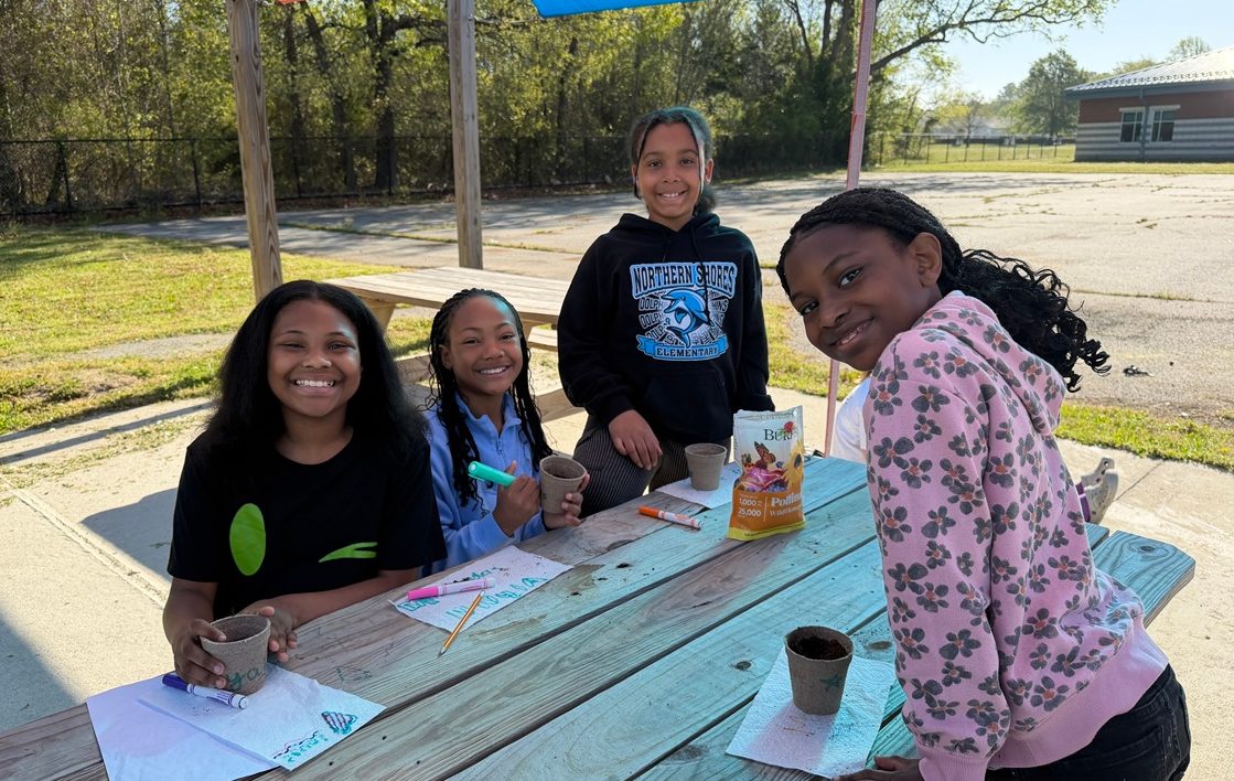 Community Troop Girl Scouts decorated special seed planters as they spent time outside