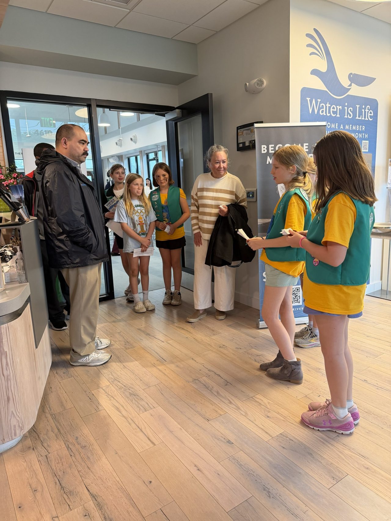 The Girl Scouts of Troop 45 at the Norfolk Flooding Forum giving their "pitch" to attendees.