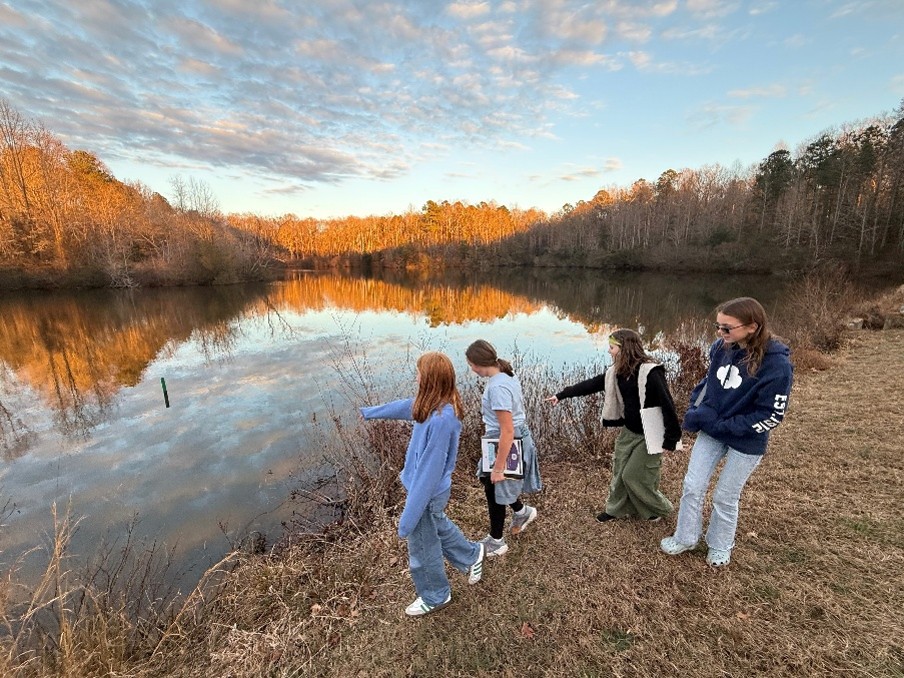 Girl Scout Cadettes Wren, Piper, Abigail, and Emma on the waterfront