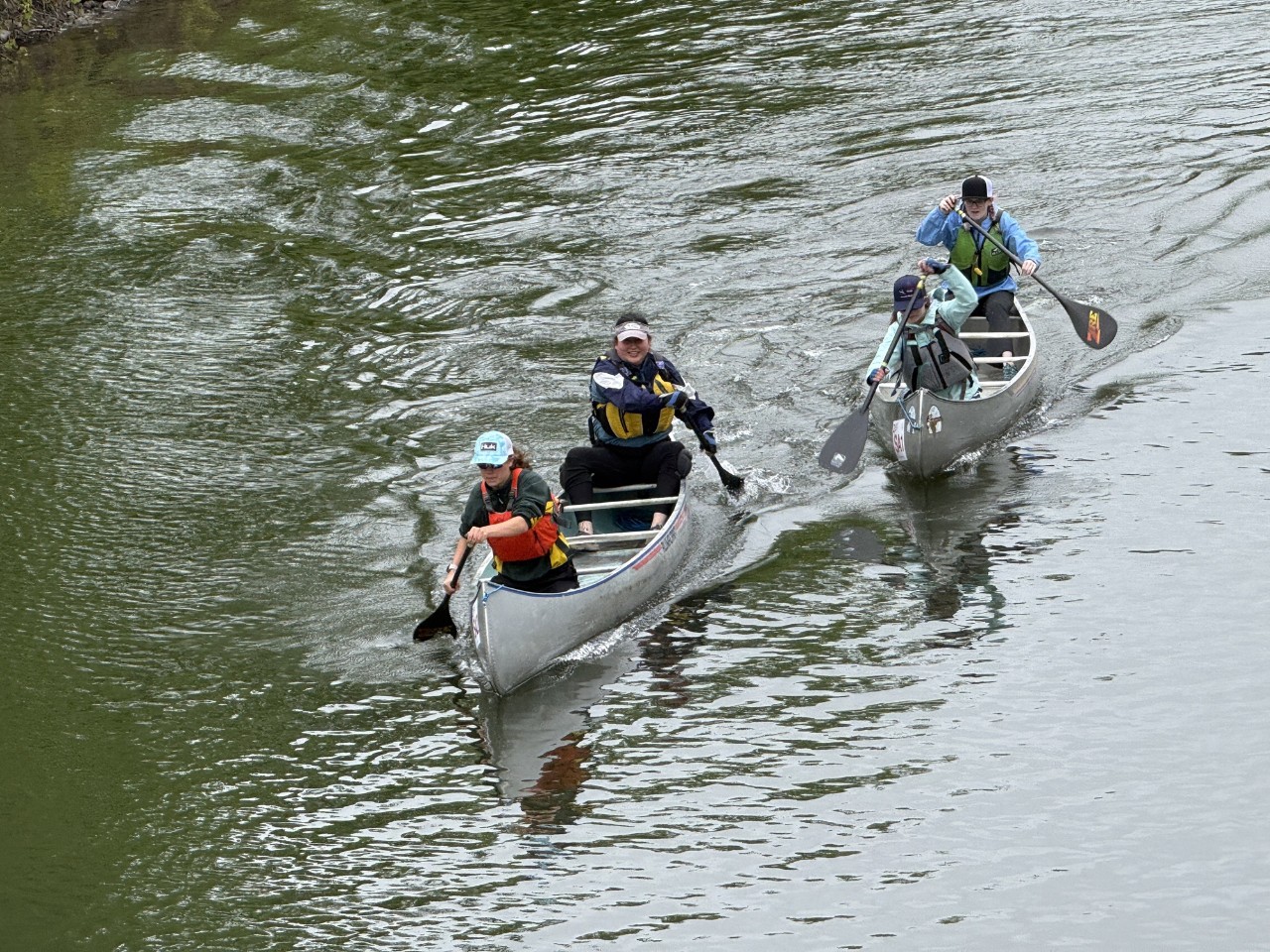 Isabella Gonzalez, Charlotte Engin, Beth McCardle-Blunk and Kayleigh Adamson in the 15-mile Women's Stock Aluminum Race on the Susquehanna River 