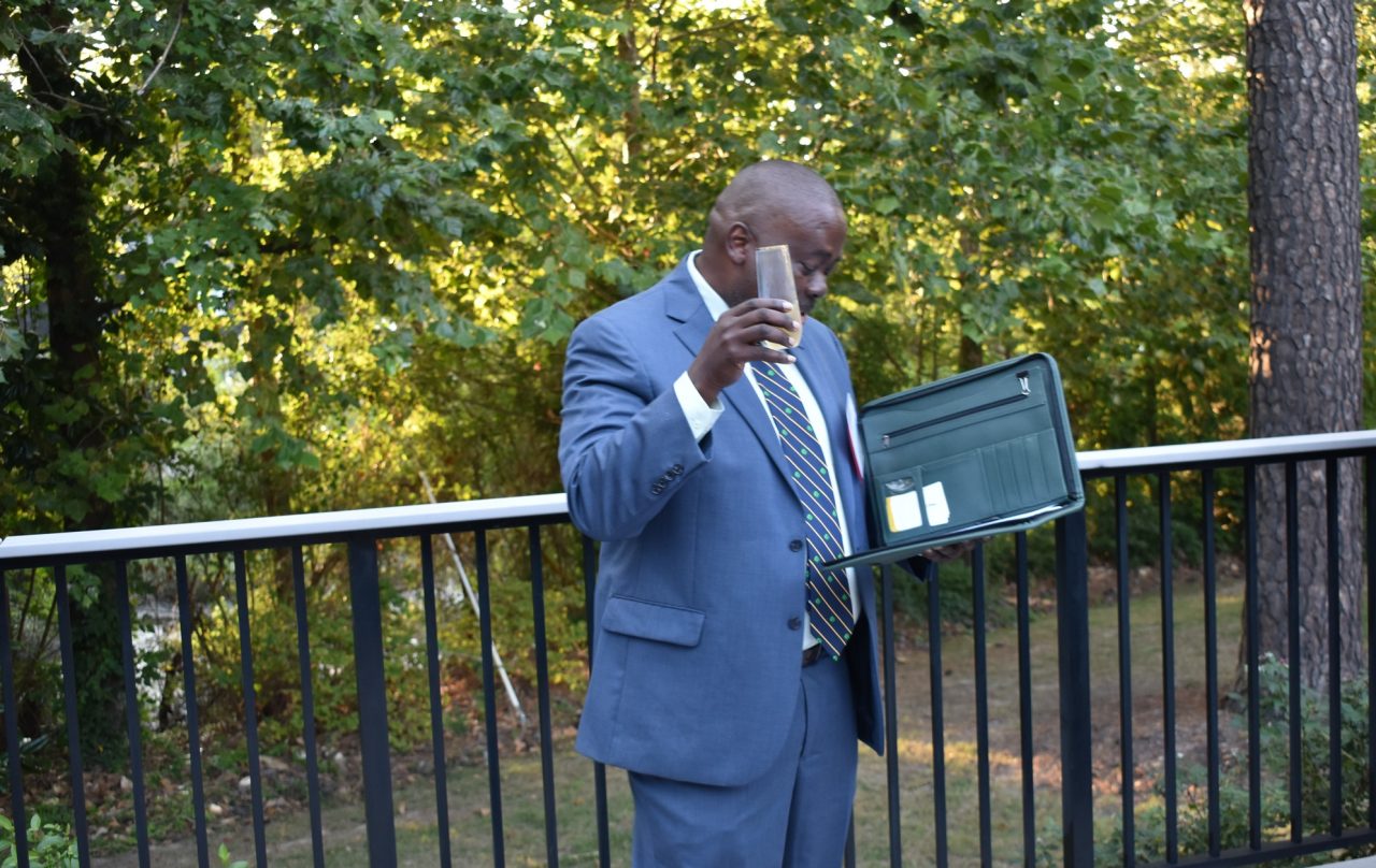 Leonard Brown led the champagne toast