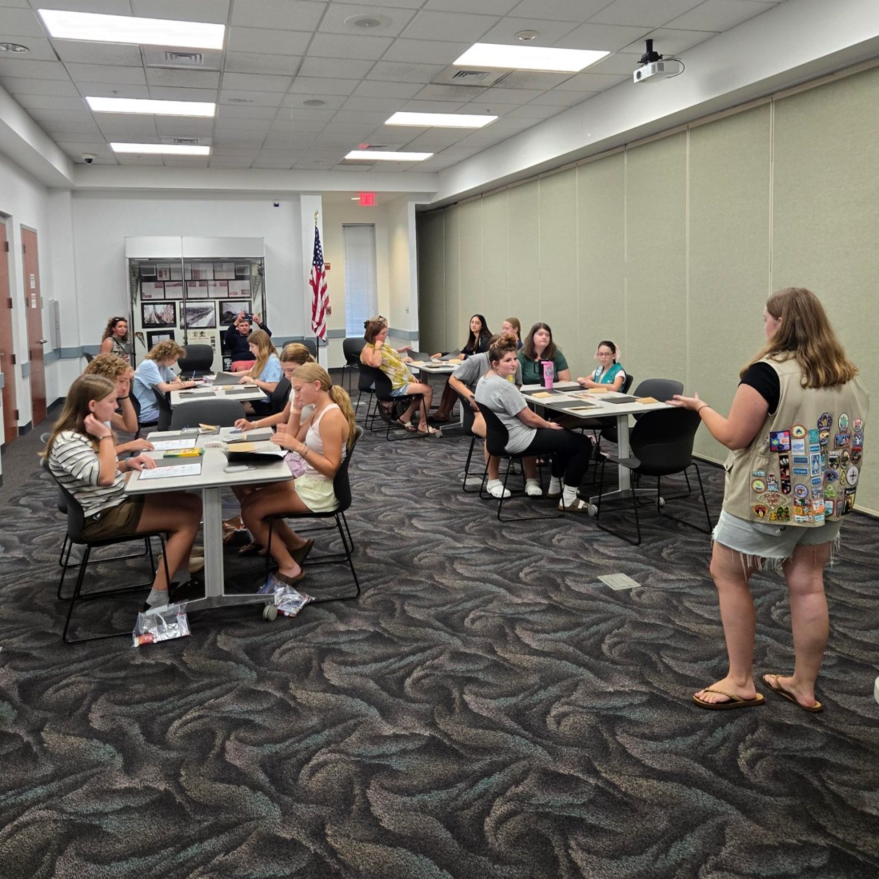 Girl Scout Ambassador Abby S. from Troop 396 in Norfolk leads a workshop