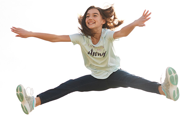 young girl jumping