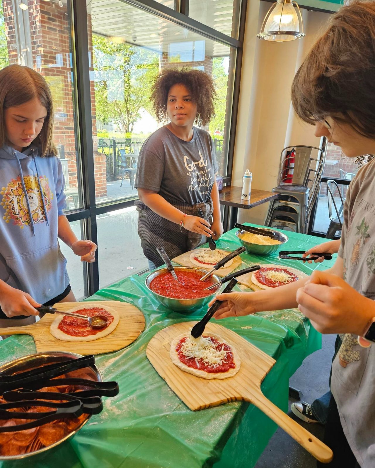 GSCCC Cooking Club making pizza
