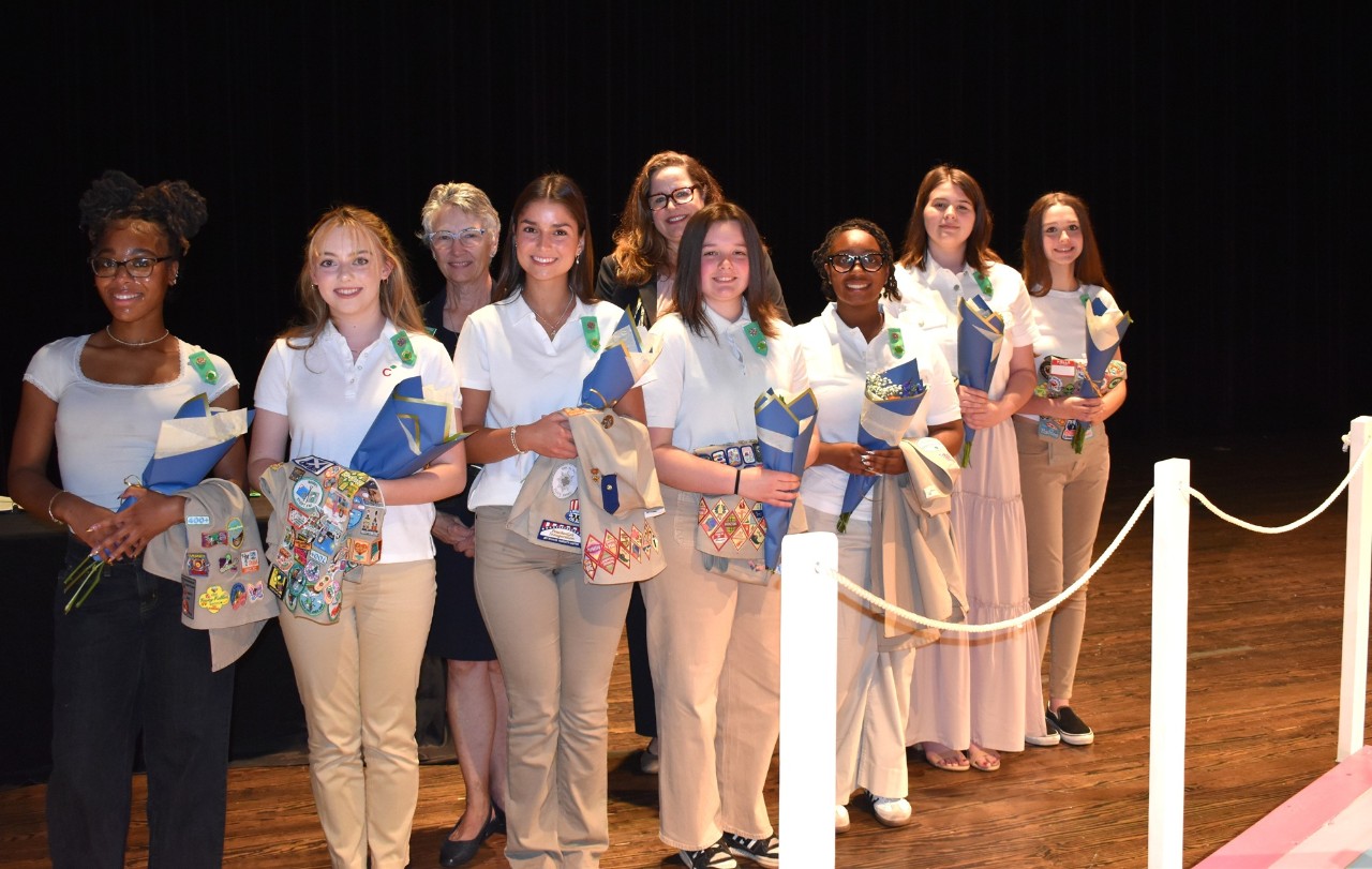 Girl Scouts who were high school graduates, including many Gold Award recipients, bridged to Adult members in a special ceremony at the 2026 event.
