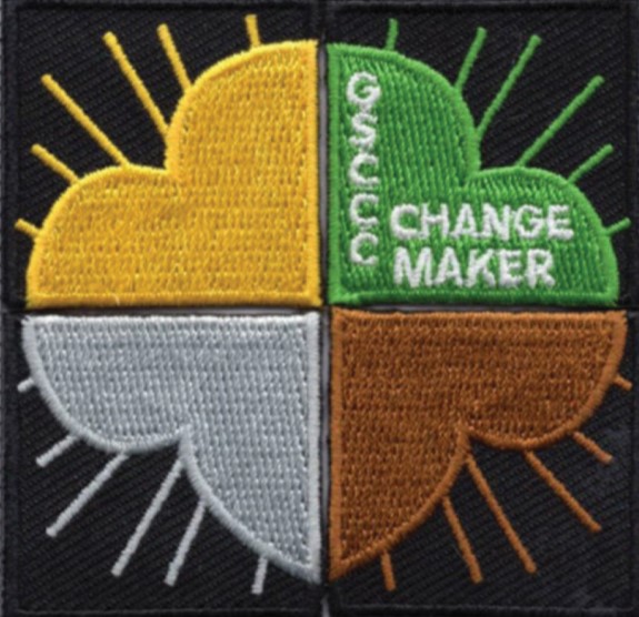 The Change Maker Award is a puzzle piece, and each piece of the puzzle represents the highest award a Girl Scout has earned for her grade level.