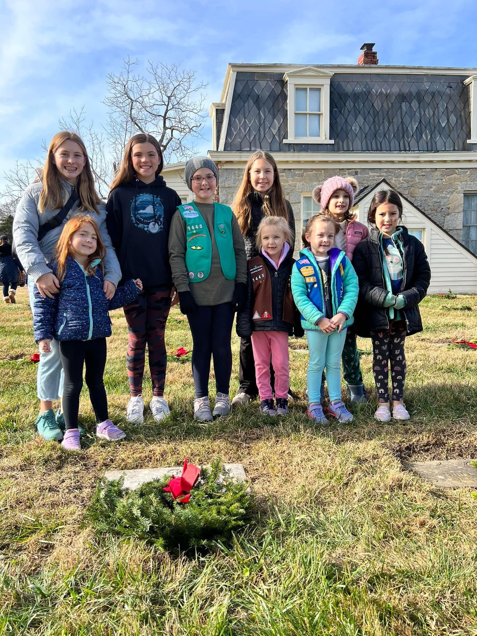 Girl Scouts from Girl Scouts of the Colonial Coast Troop 1445 of Williamsburg lay wreaths at Yorktown National Cemetery.